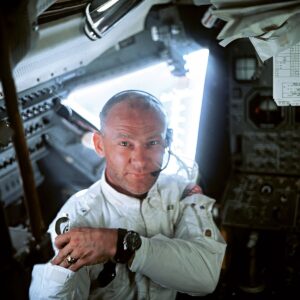 1969-buzz-aldrin-in-the-cockpit of the lunar module wearing his omega speedmaster